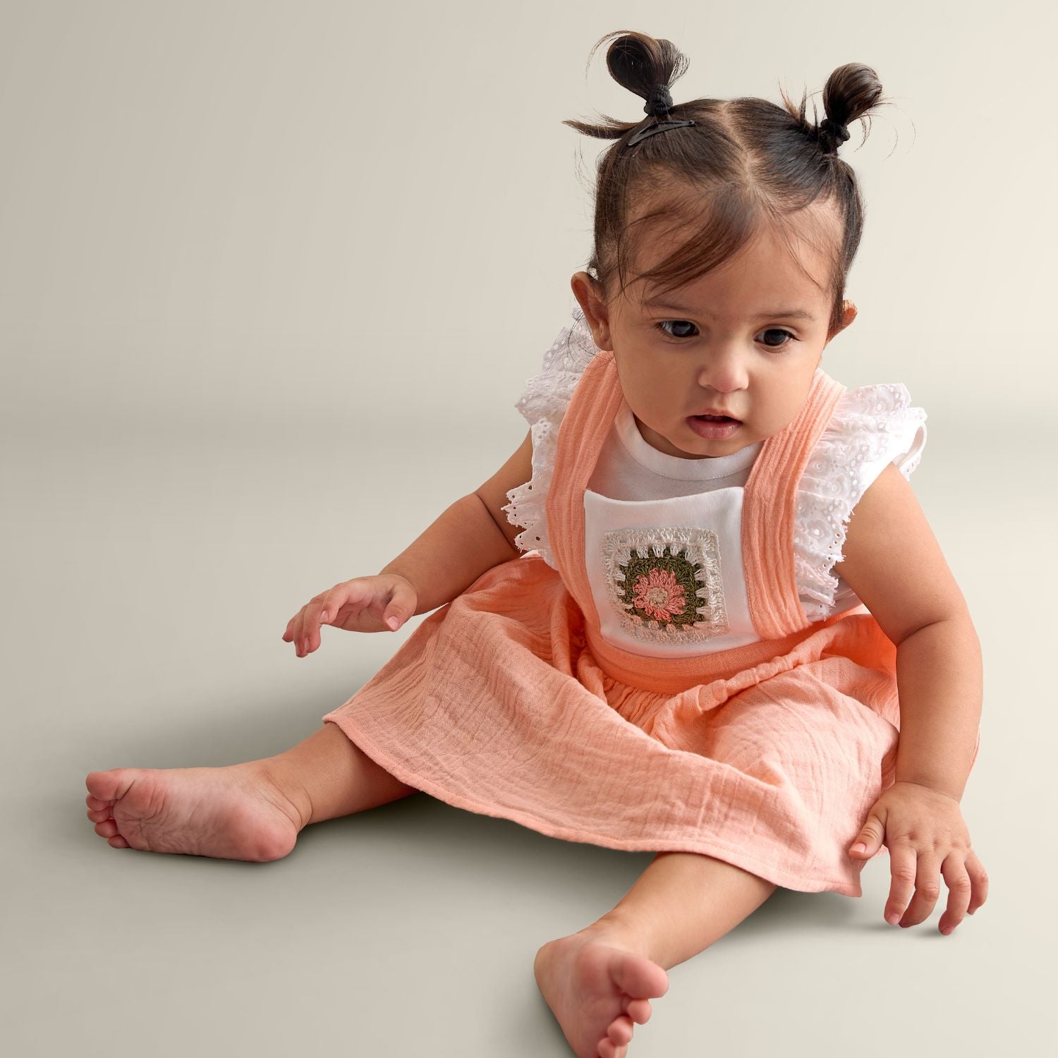 My Milestones Peony Handcrafted Crochet Detail Dungaree Dress in Double Cloth with Bio-Wash Ruffle Detail Tee - Peach