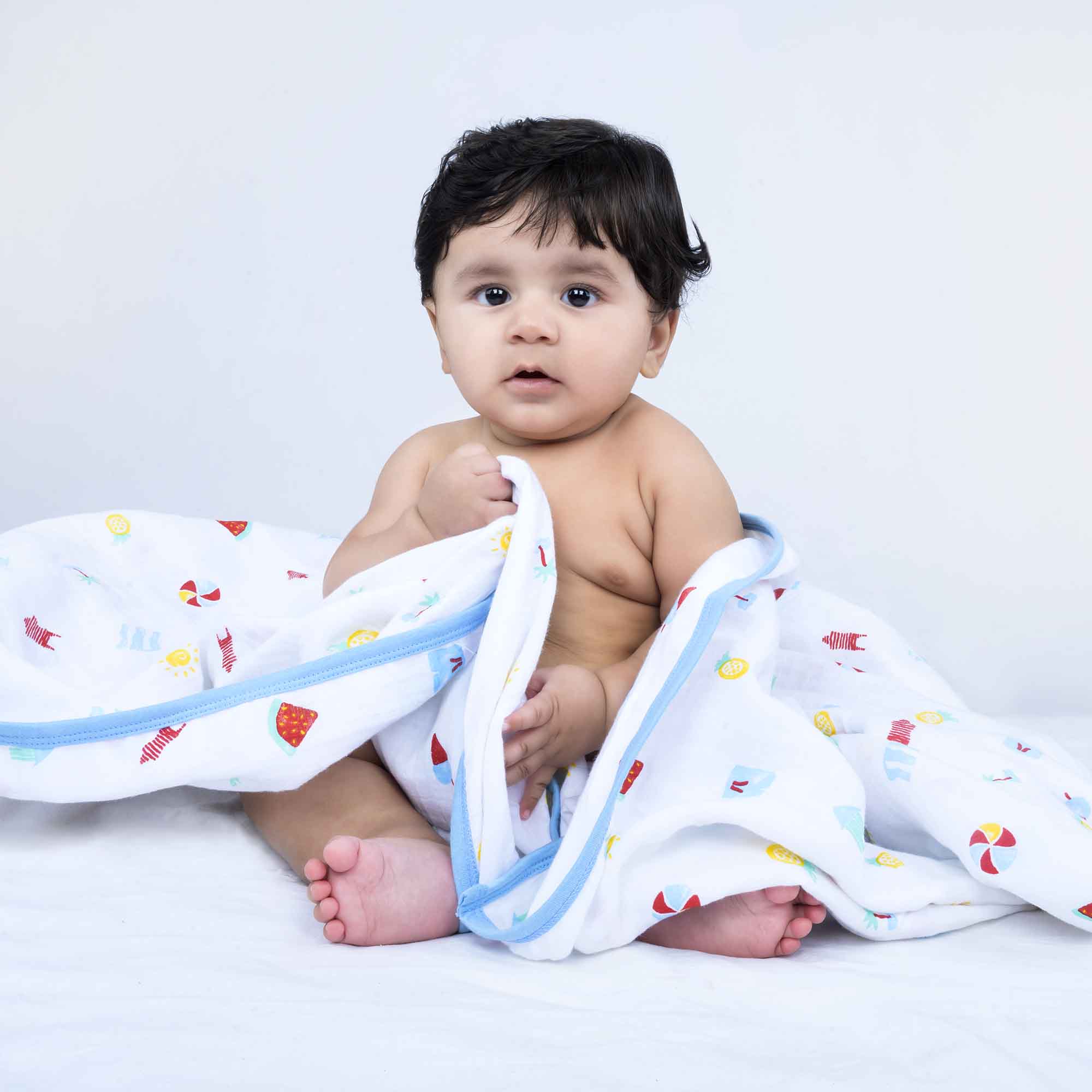 Theoni 100% Cotton Muslin Snuggle Blanket-Holiday Hues