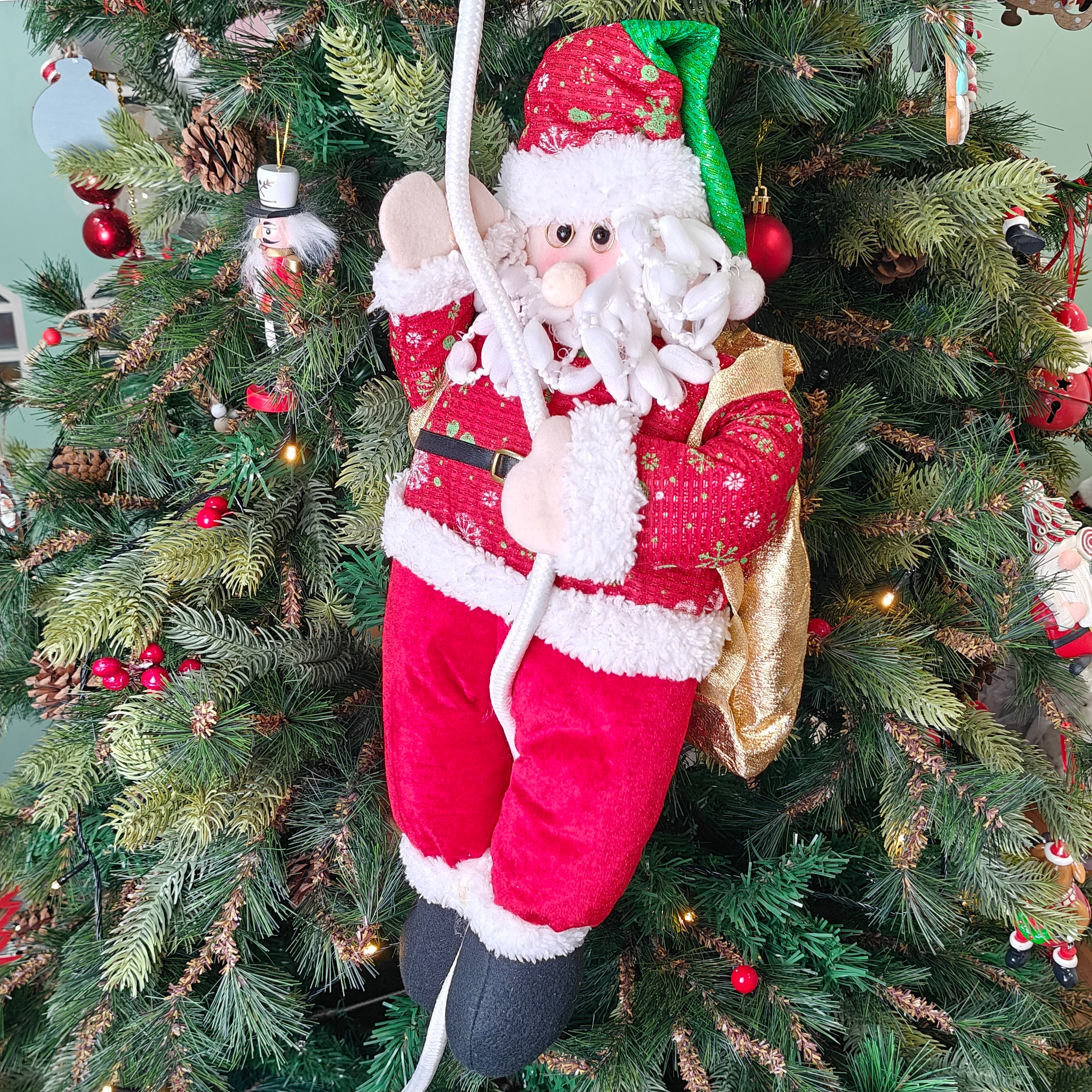 Festive Green Hat Santa on a Tree