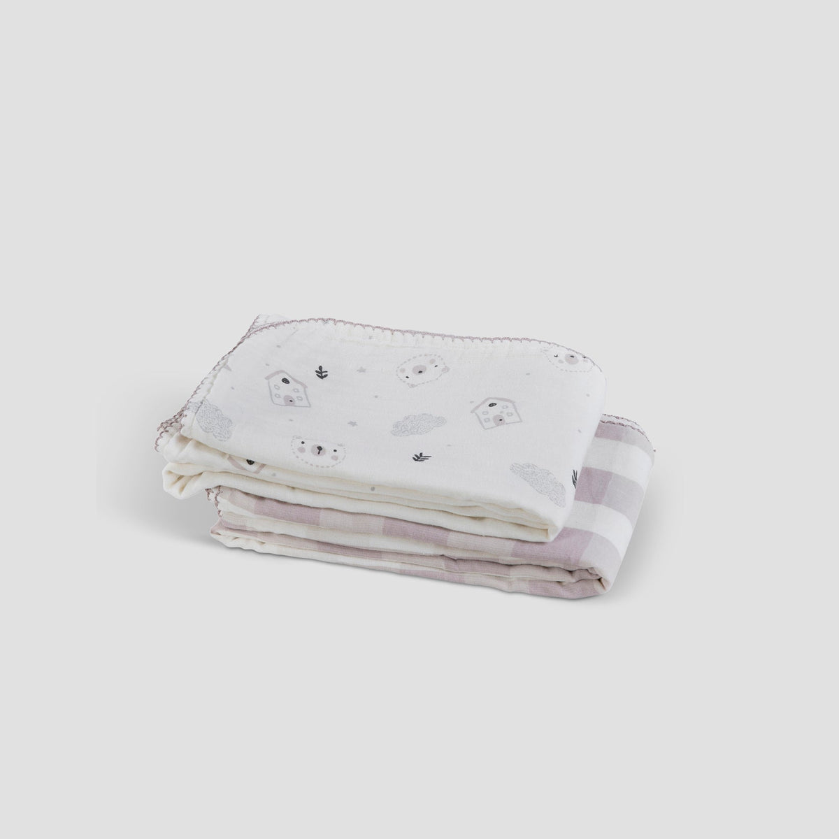 Folded fabric with a subtle pattern on a white background