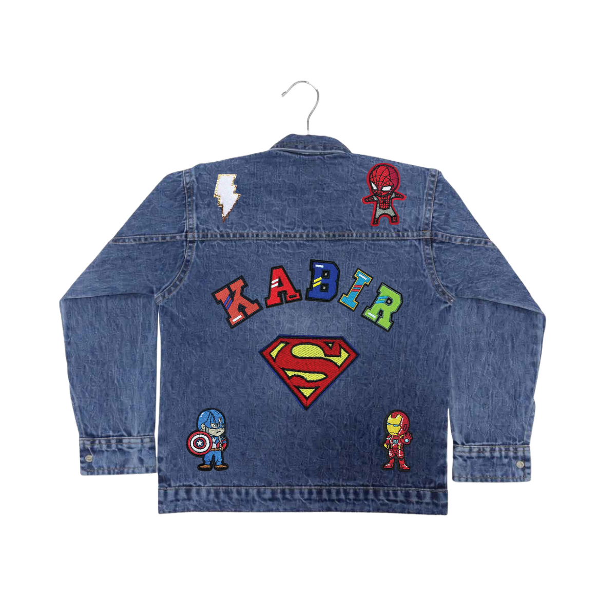 Blue denim jacket with superhero-themed patches on a white background