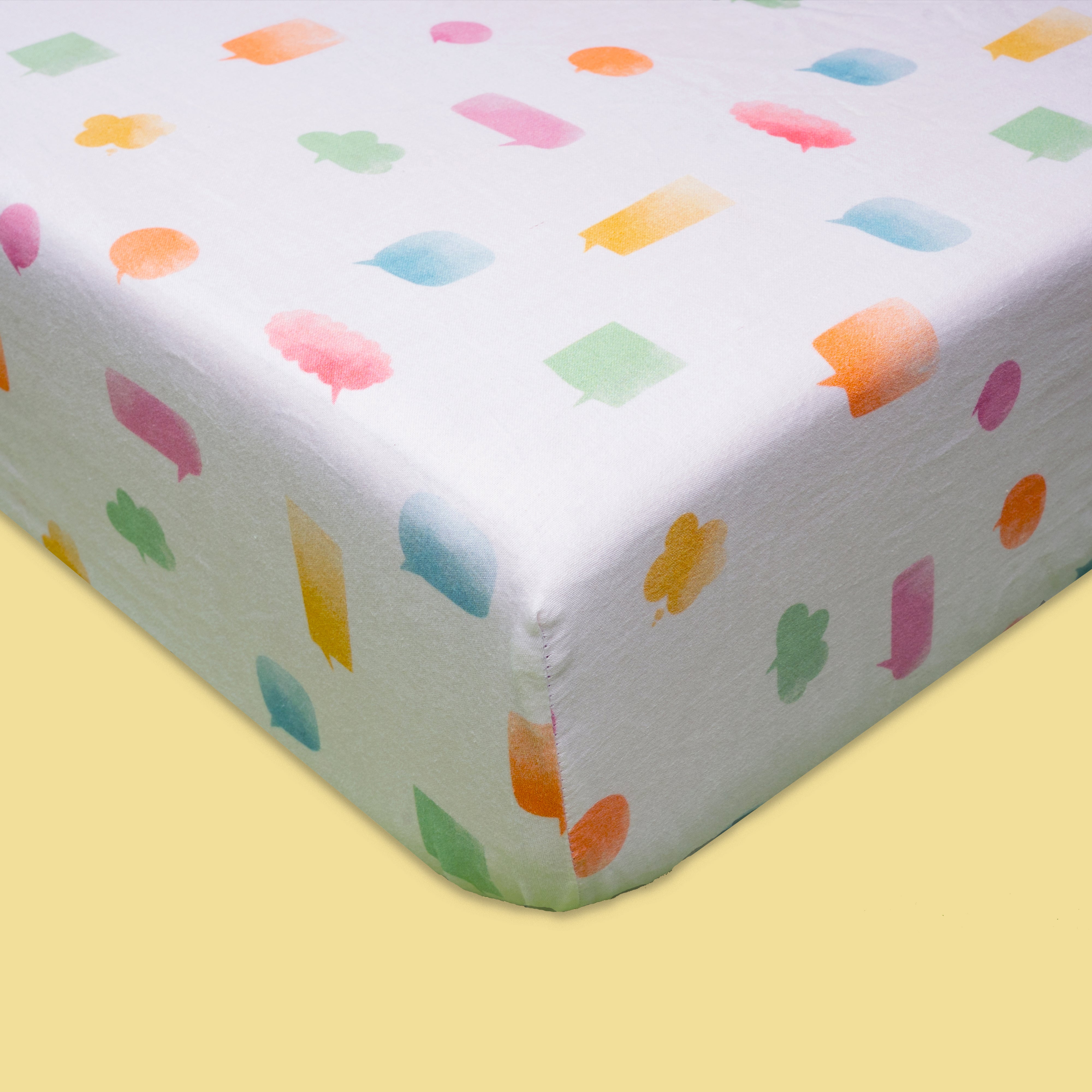 Tiny Snooze Organic Fitted Cot Sheet- Speech Bubbles