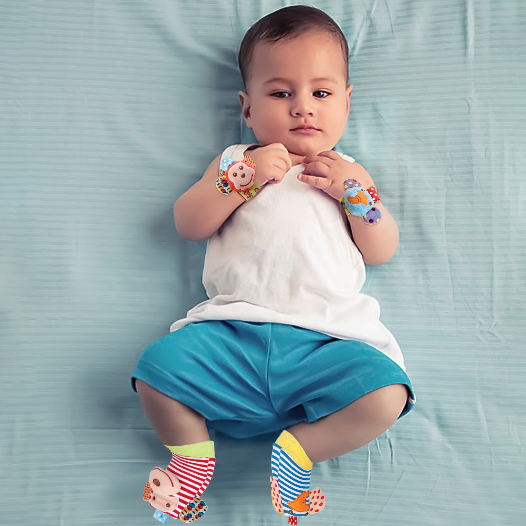 Baby Moo Elephant And Monkey Multicolour Set of 4 Socks And Wrist Rattle