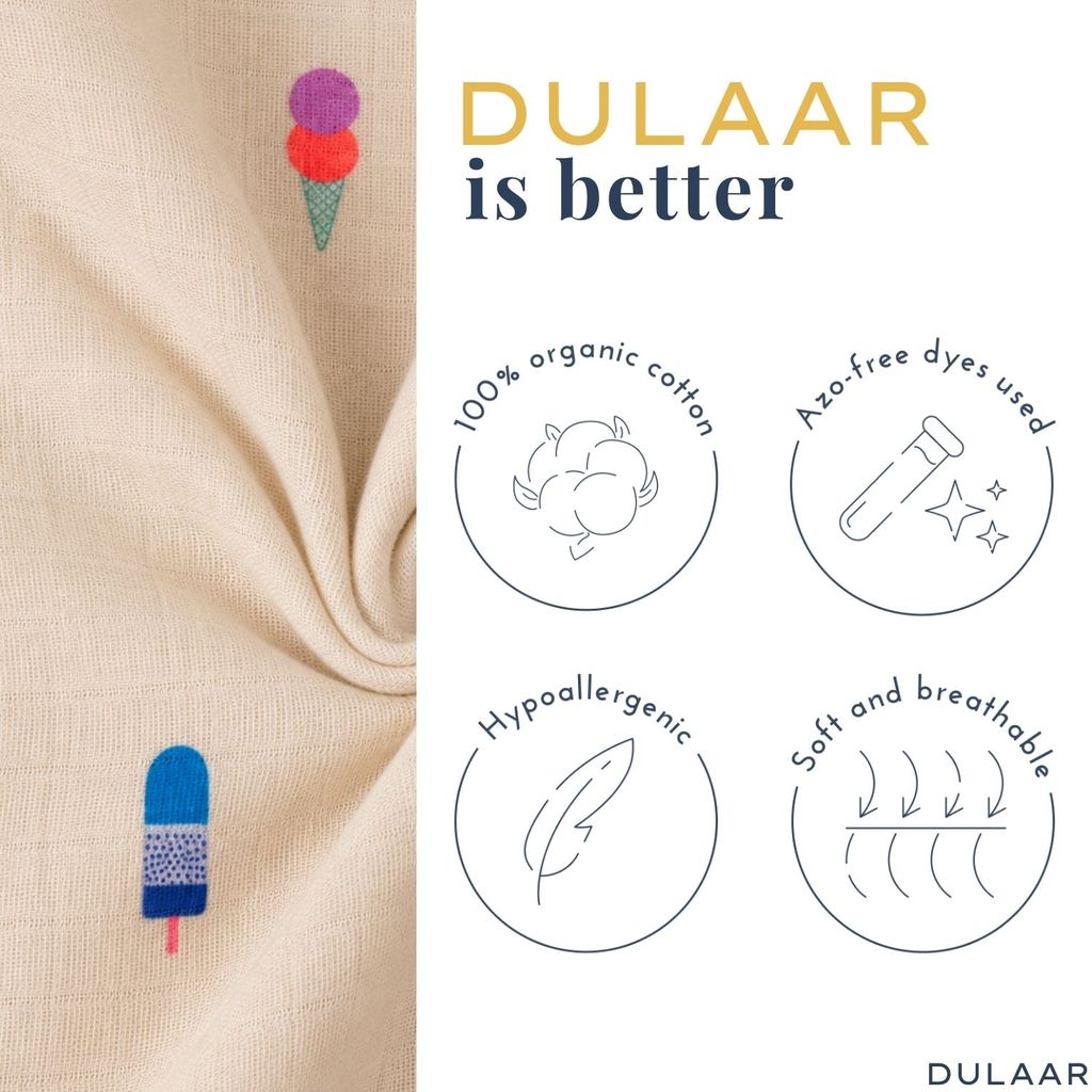 Textile with ice cream and popsicle designs on beige fabric, featuring Dulaar branding and sustainability claims.