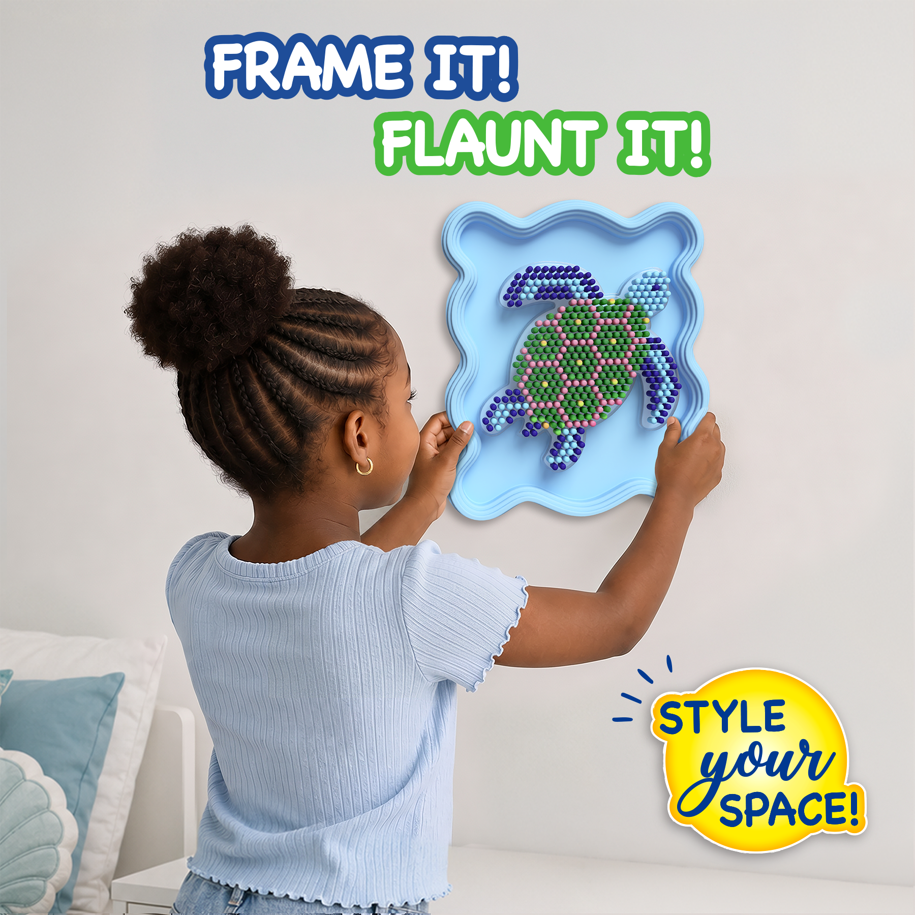 Child holding a blue frame with a turtle design, with text encouraging to frame and flaunt one's space.