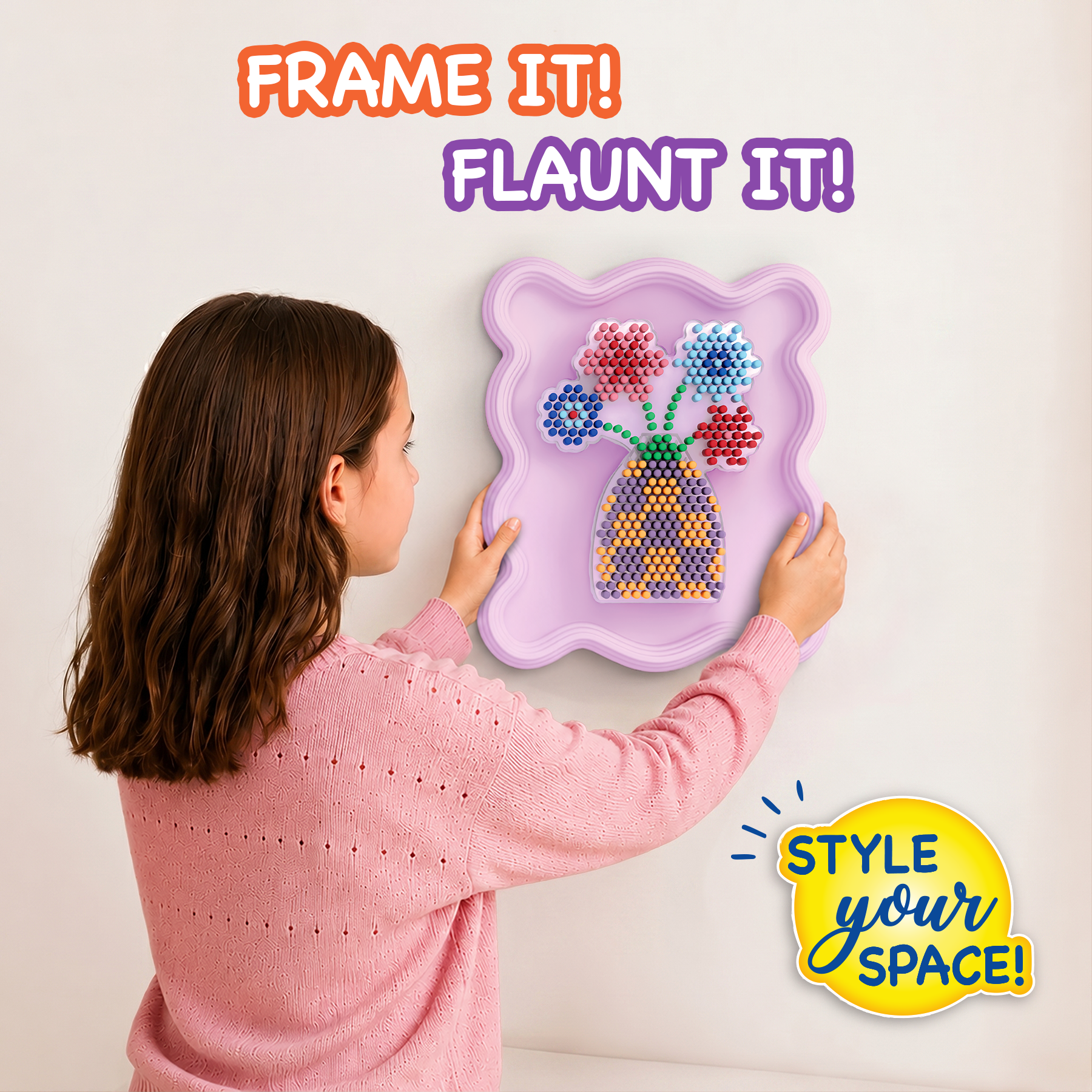 Woman holding a purple frame with a floral design, text 'Frame It! Flaunt It! Style Your Space!' on a white background