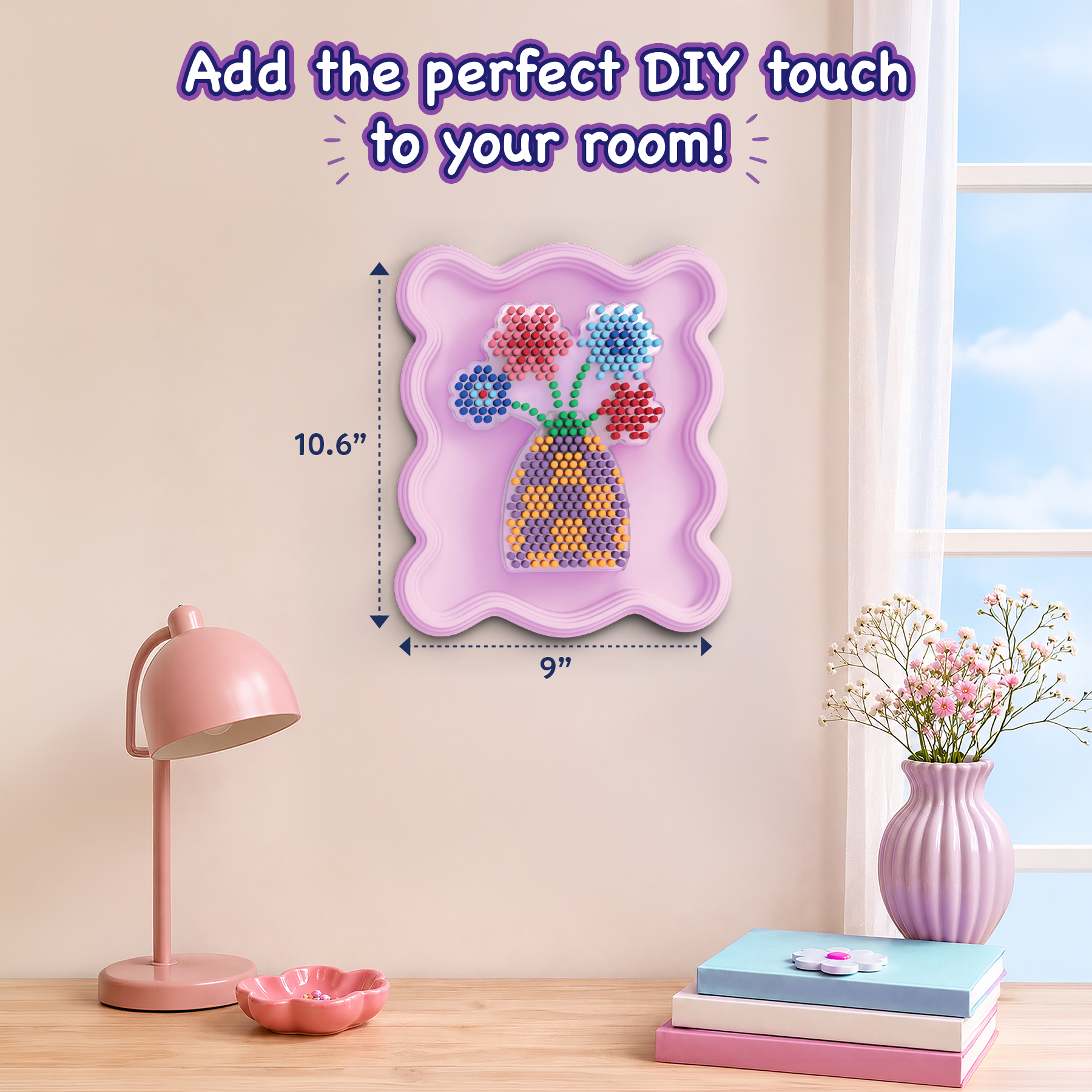 Wall art with a floral design on a pink frame, measuring 10.6" x 9", in a room setting with a lamp and books.