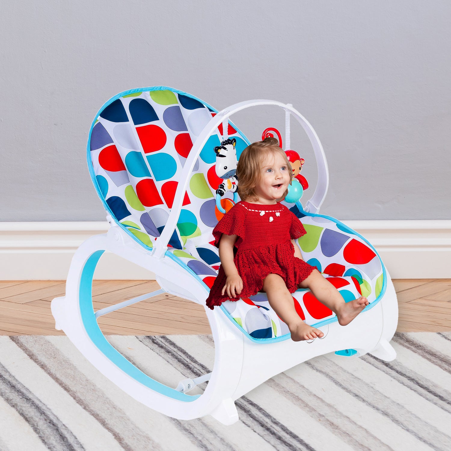 Baby Moo Infant To Toddler Polka Dotted Portable Rocker With Hanging Toys Blue