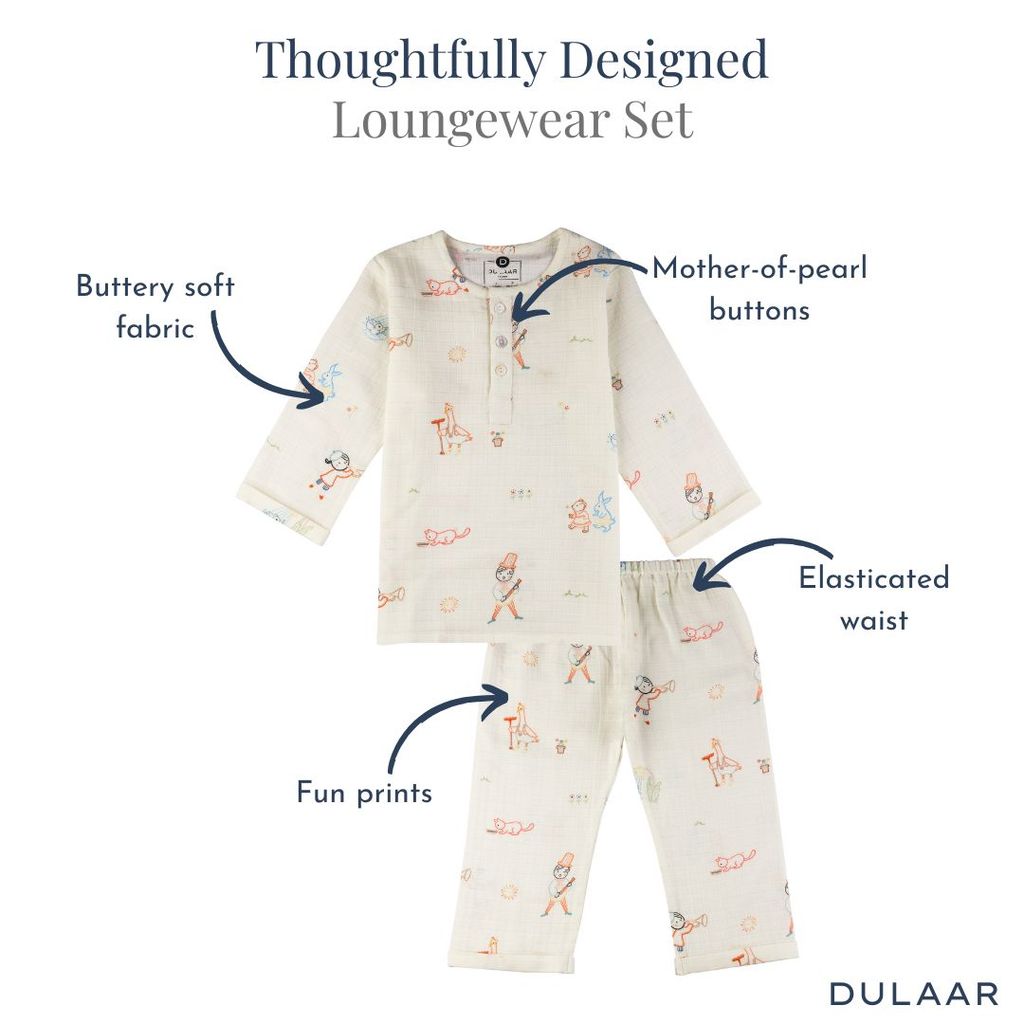 Children's loungewear set with features highlighted on a white background, branded 'Dulaar'.
