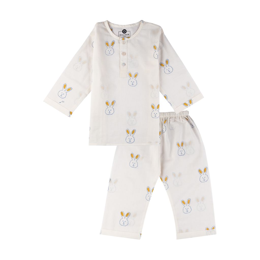 Children's pajama set with bunny pattern on a white background
