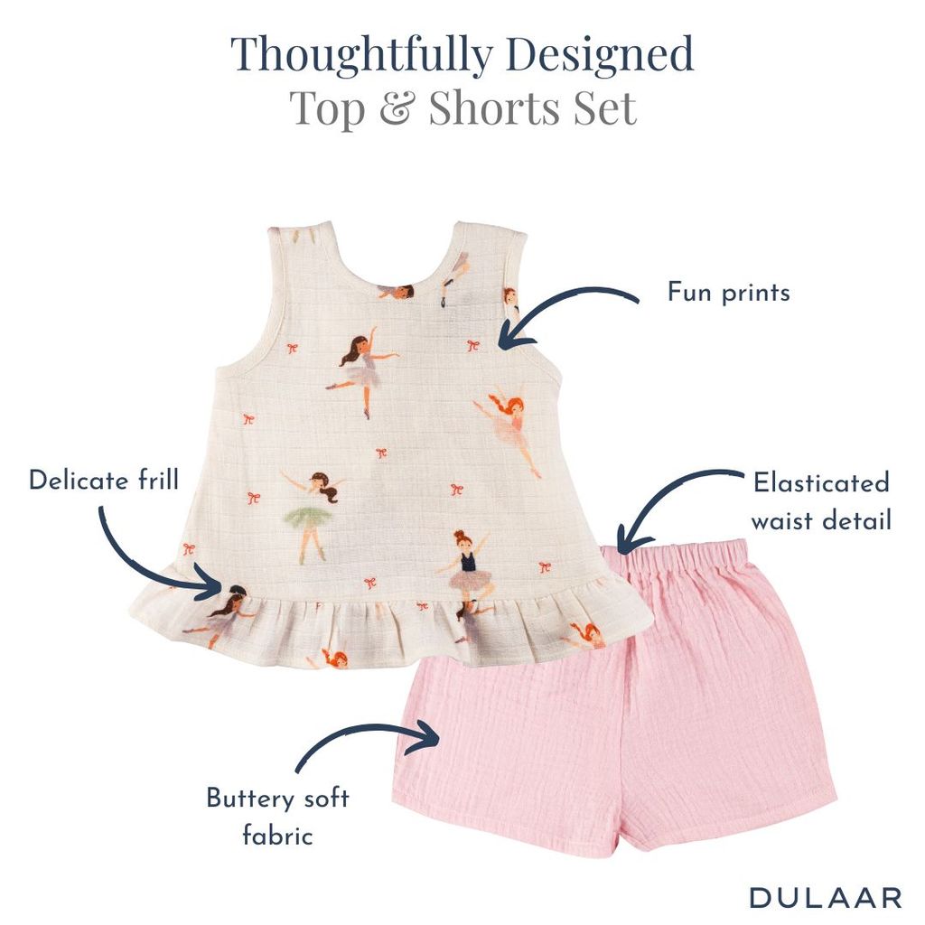 Children's top and shorts set with features highlighted on a white background, branded 'Dulaar'.