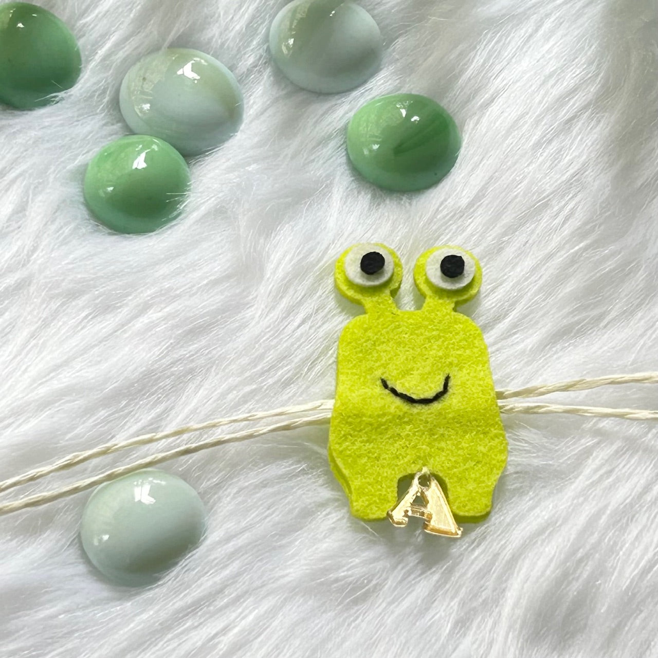 Babble Wrap Handmade Felt Rakhi With Initials - Giggly Monster
