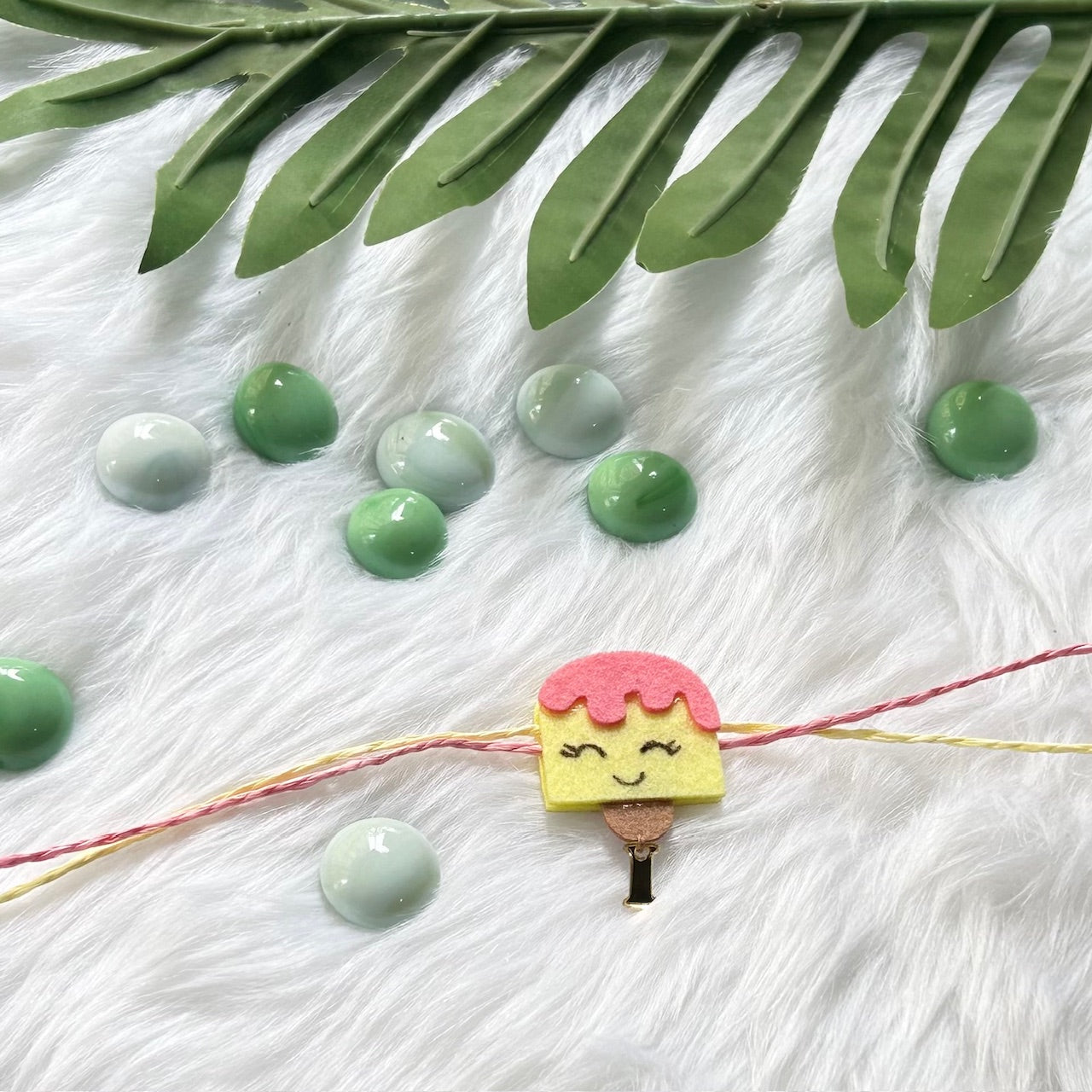 Babble Wrap Handmade Felt Rakhi With Initials - IceCream