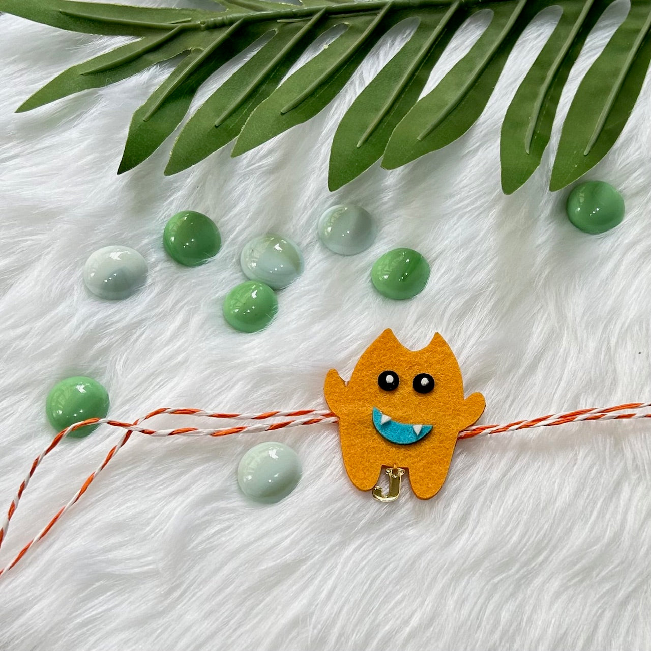 Babble Wrap Handmade Felt Rakhi With Initials - Silly Monster
