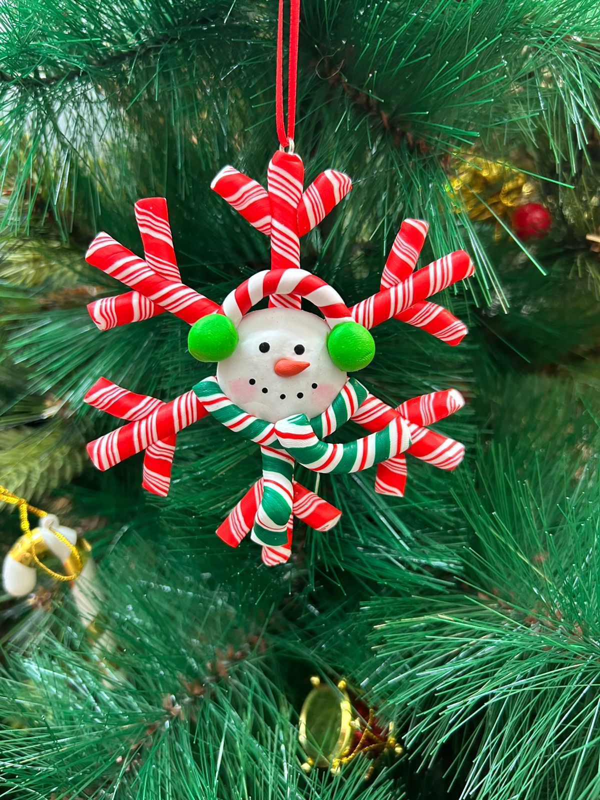 Snowman in a Snowflake Ornament