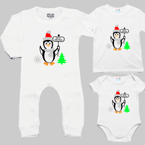 files/LH_FirstChristmas_PenguinHoldingBanner_WhiteVariation.png