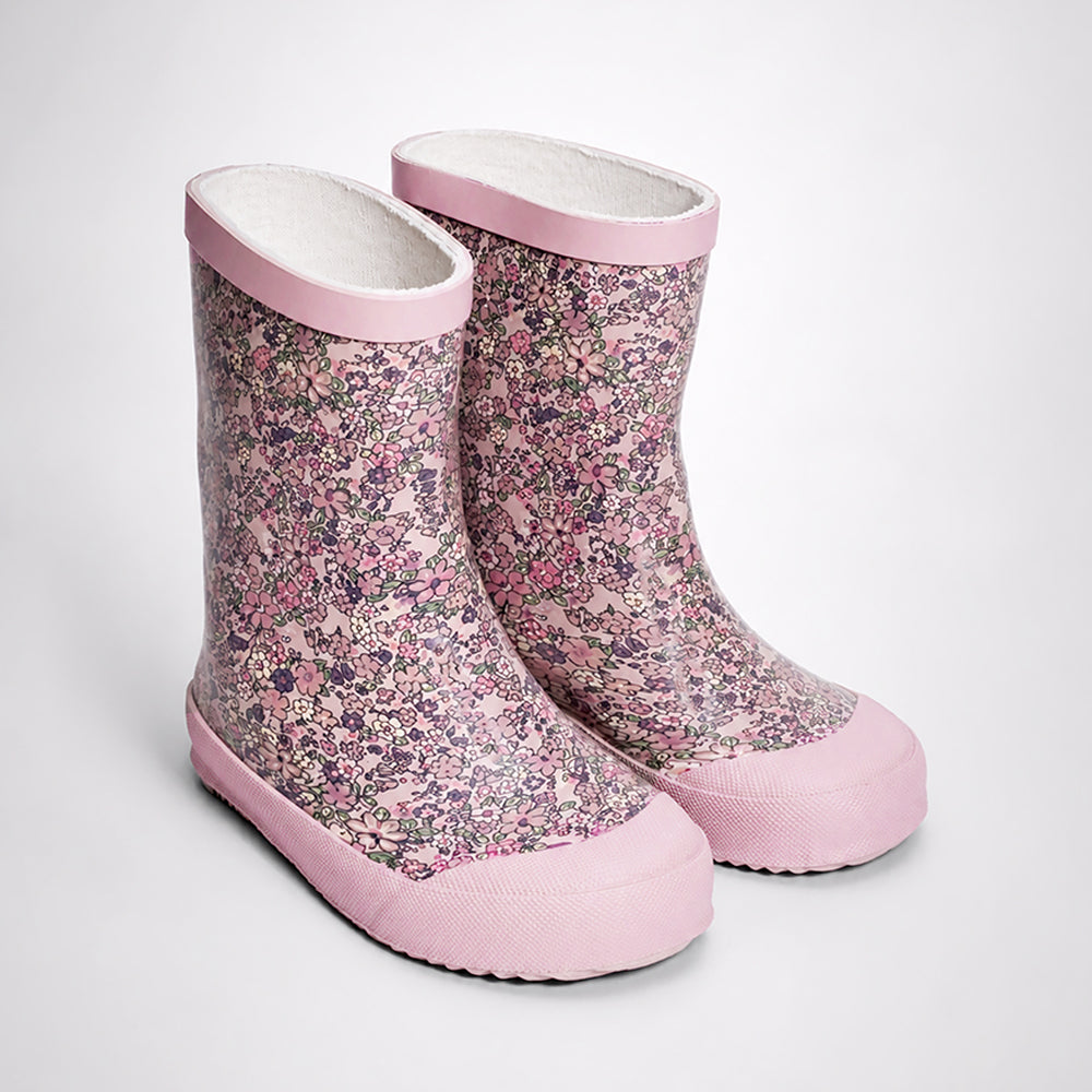 Pair of pink floral-patterned boots on a light gray background