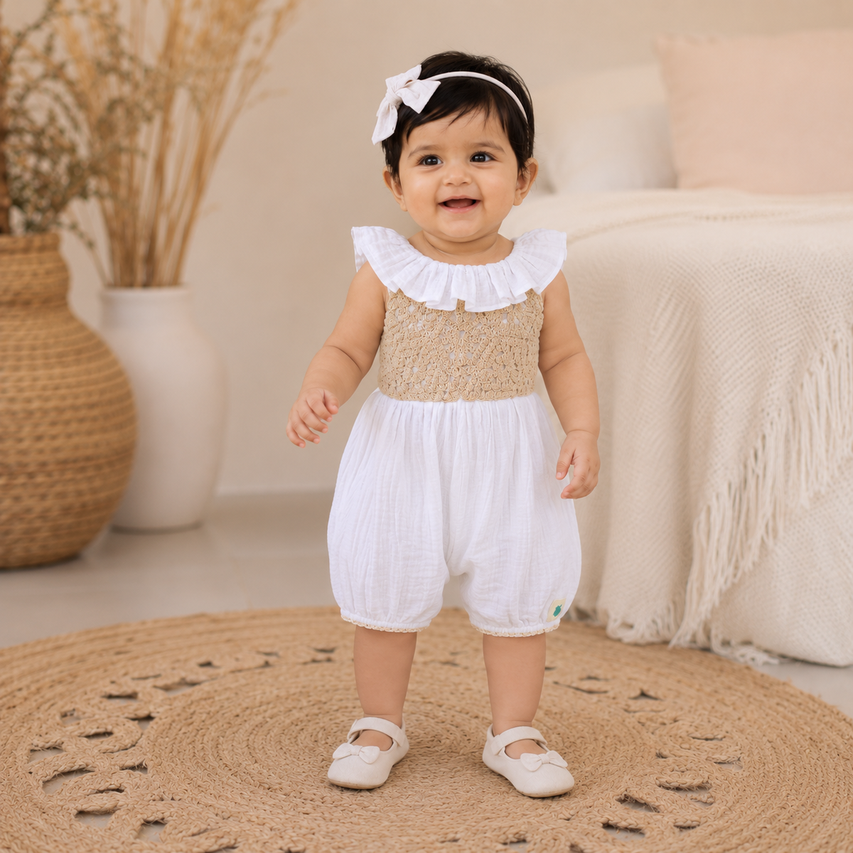 My Milestones Fawn Crochet Yoke Romper in Double Cloth with Ruffle Details - White