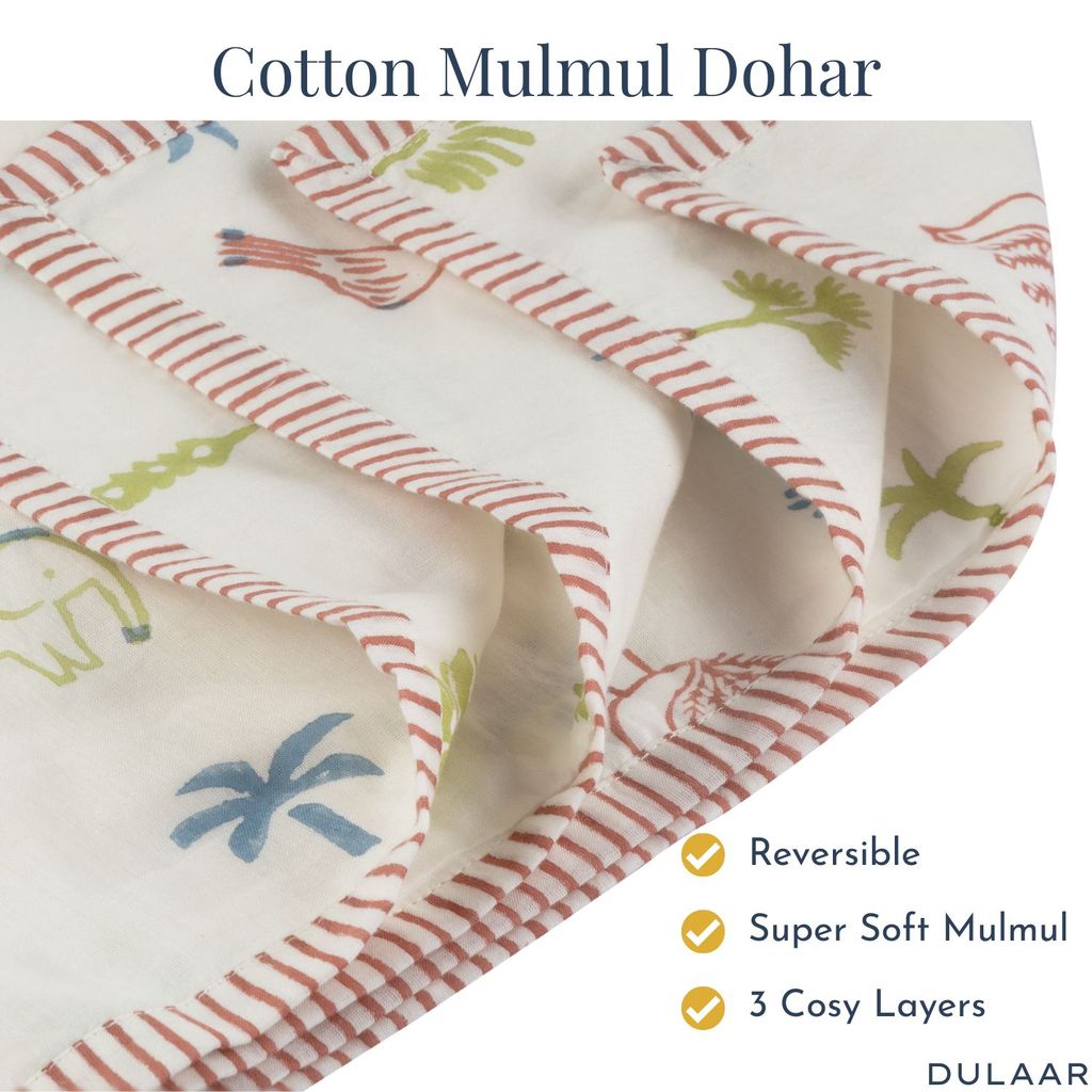 Cotton Mulmul Dohar fabric with elephant and plant patterns, featuring reversible, super soft, and three cozy layers on a white background.