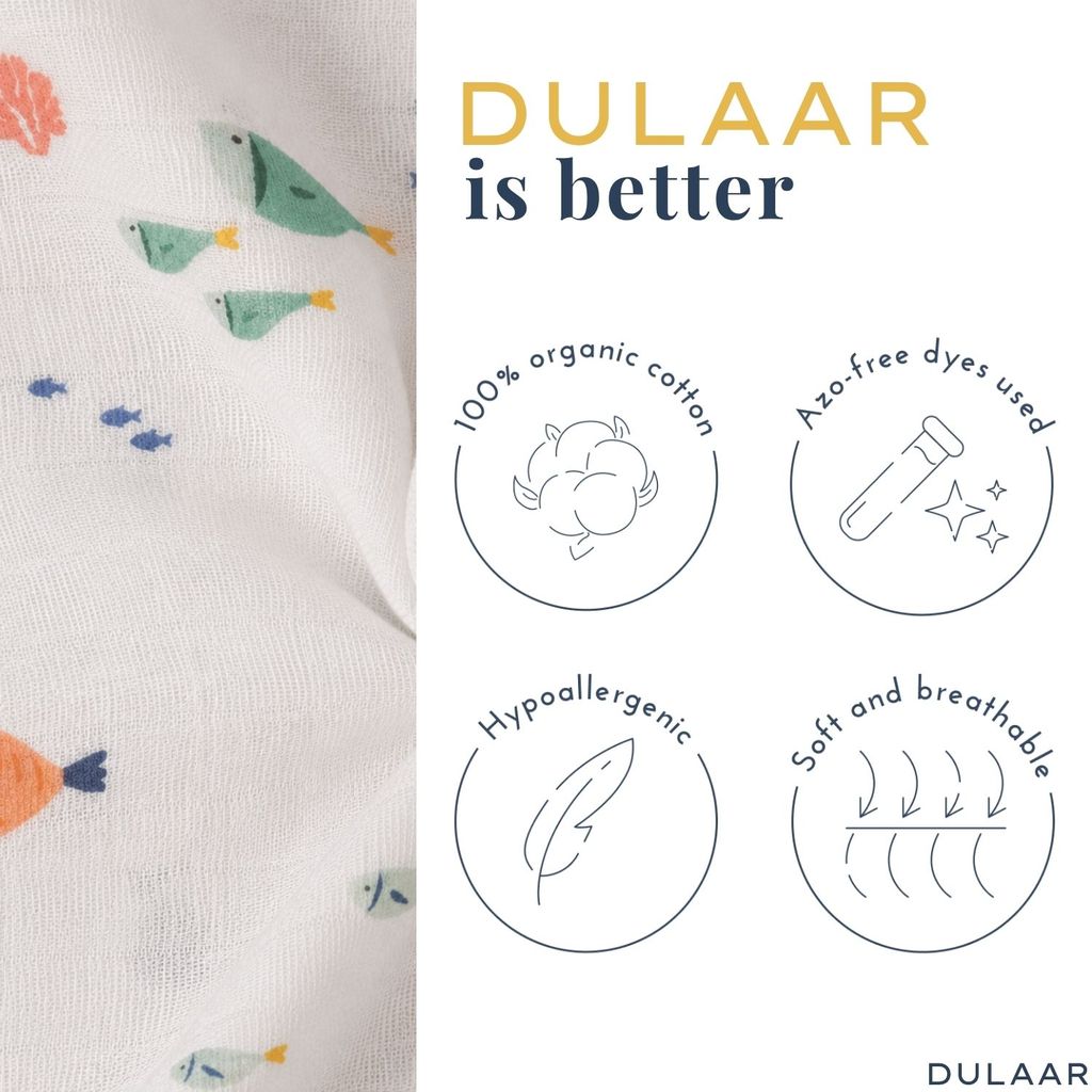 Product with fish pattern and Dulaar branding highlighting organic cotton and safety features.