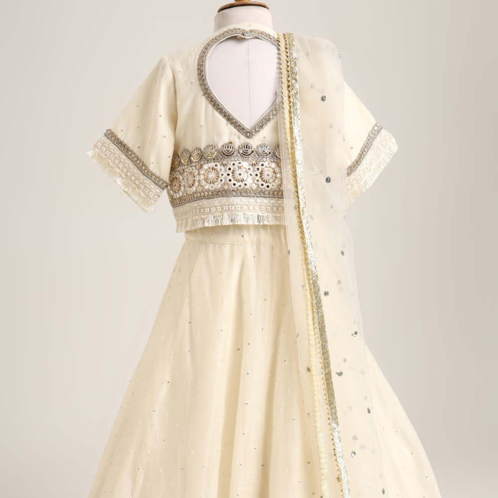 Chanderi Jacket style choli paired with a chanderi lehnga with sequin emb and Soft Net Dupatta.
