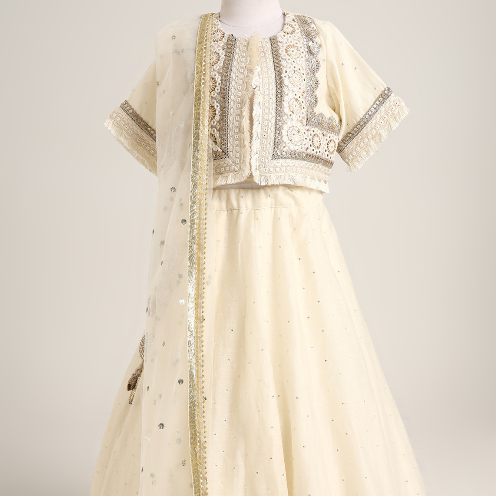 Chanderi Jacket style choli paired with a chanderi lehnga with sequin emb and Soft Net Dupatta.