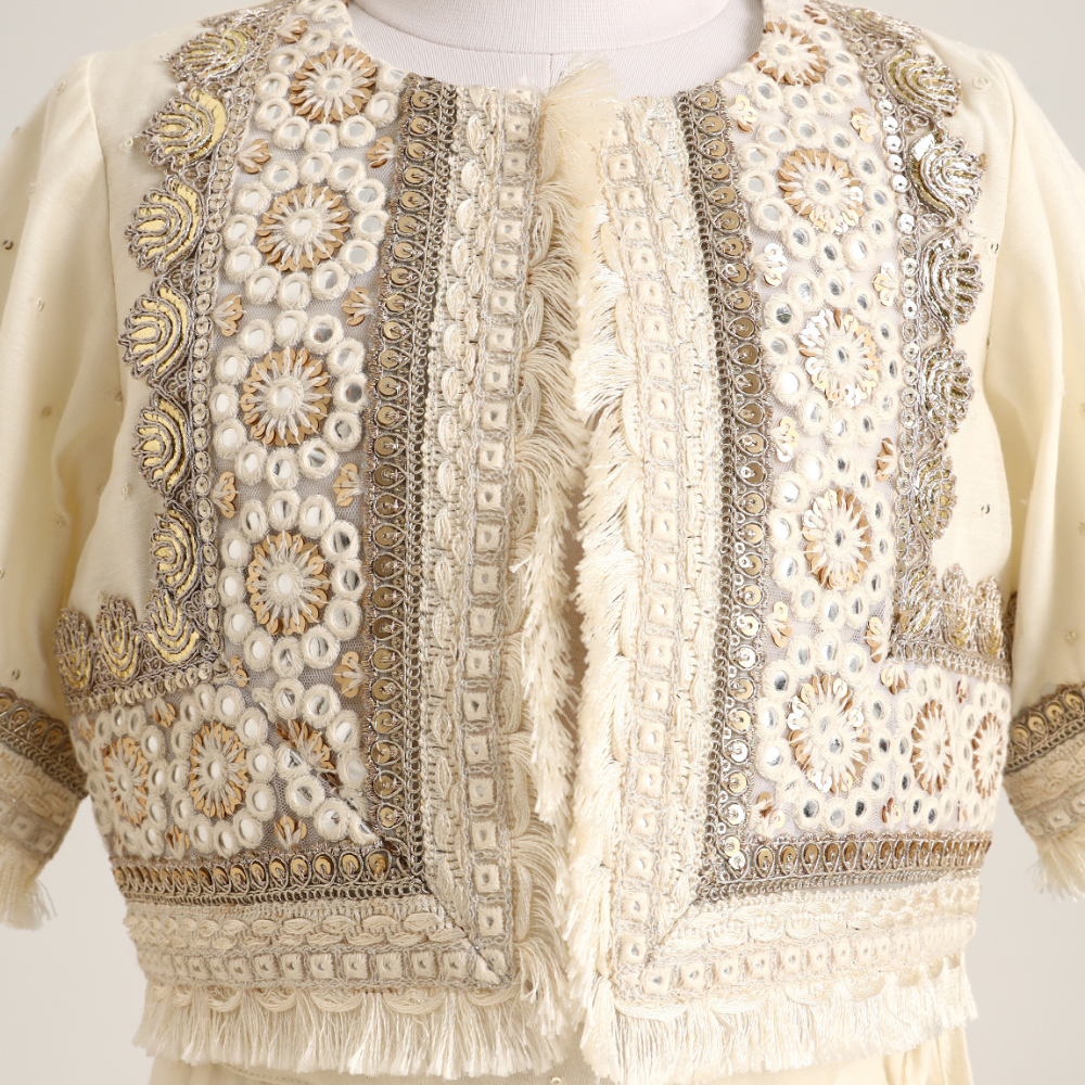 Chanderi Jacket style choli paired with a chanderi lehnga with sequin emb and Soft Net Dupatta.