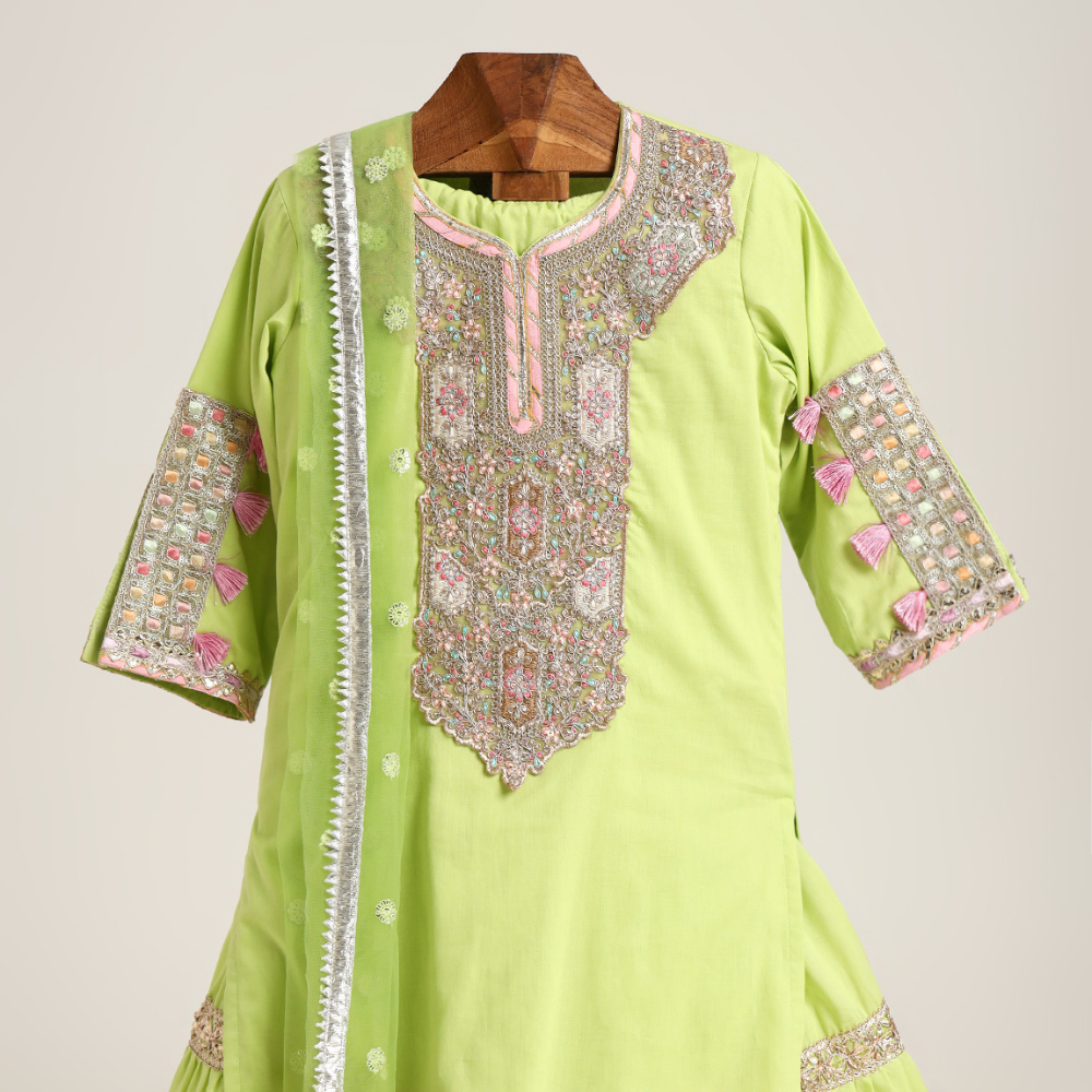 Mulmul Plain Kurta and Sharara paired with Soft Net dupatta