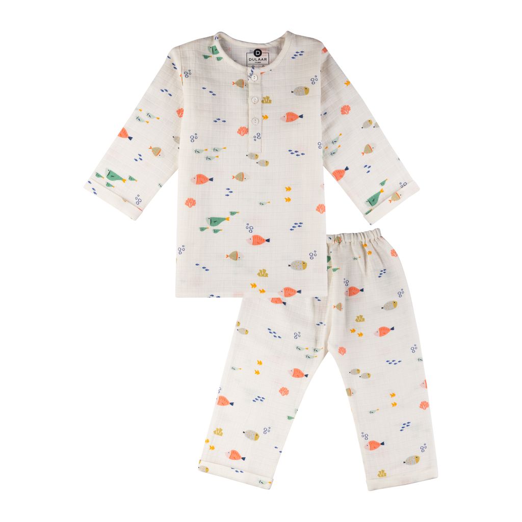 Children's pajama set with fish pattern on a white background