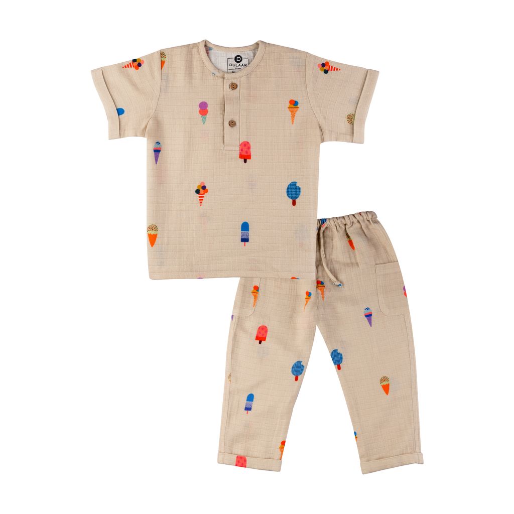 Children's pajama set with ice cream pattern on a white background