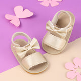 Kicks & Crawl- The Twisted Bow Golden Sandals