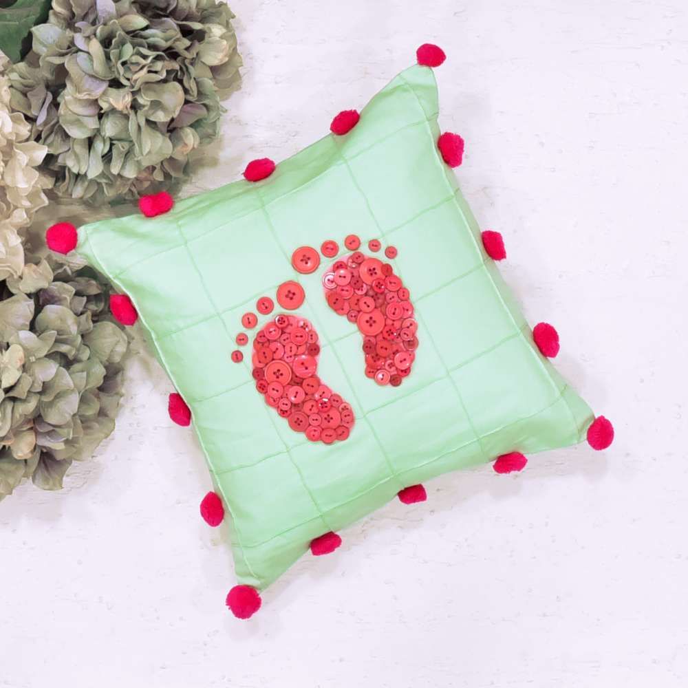 Happy Feet Button Cushion - Fuscia Pink Buttons On Pista Green Base