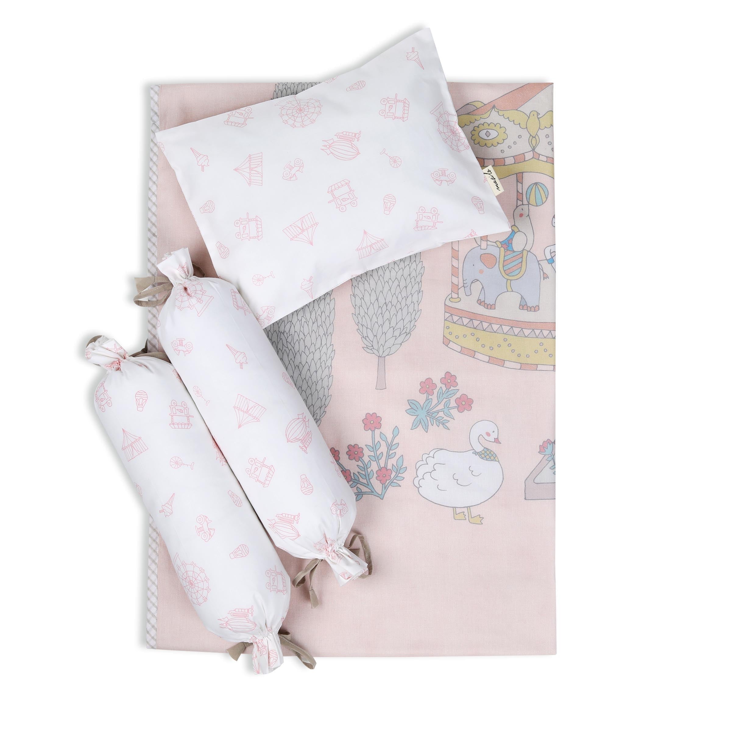Pair of Carnival Pink baby bolsters for cot bedding